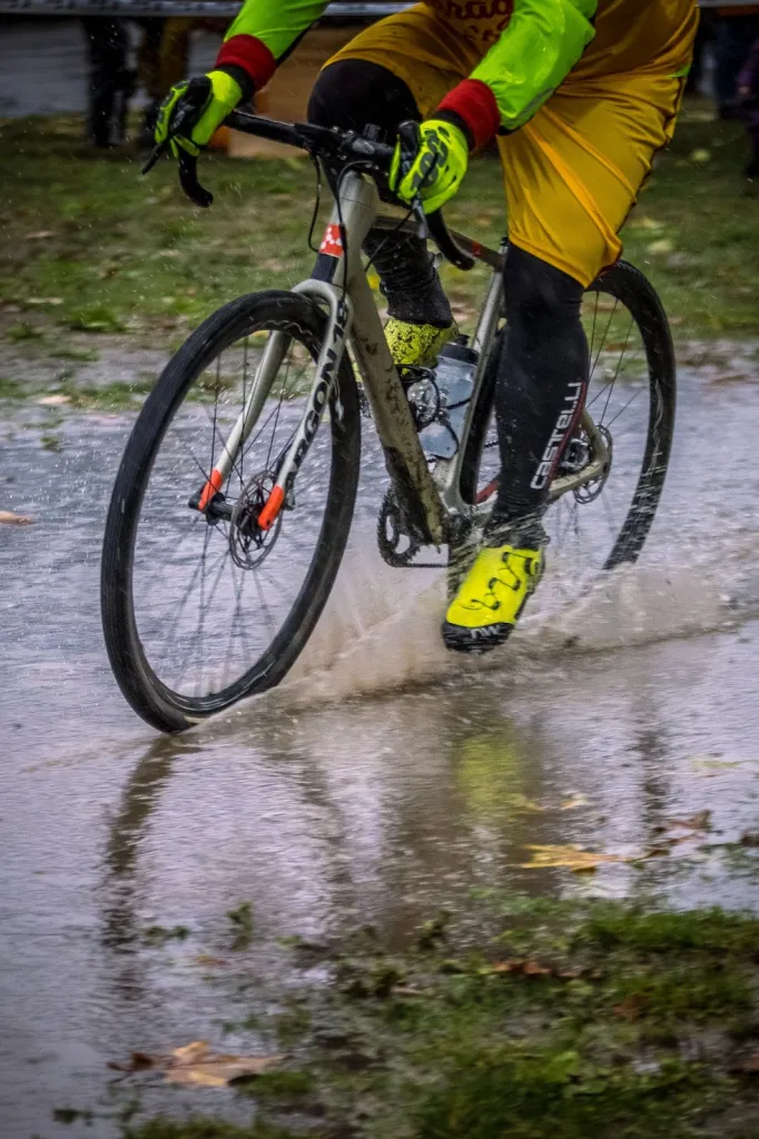 Road bike crossing a puddle Road bike crossing a puddle